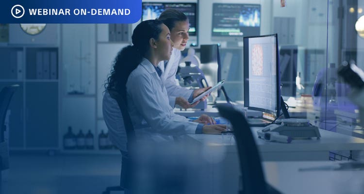 Webinar On-Demand: Photo of two researchers looking at a computer display in a lab setting.