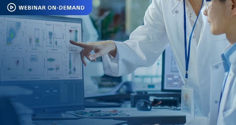 Webinar On-Demand. Photo of two researchers discussing cell sorting data on a computer display in a lab environment.