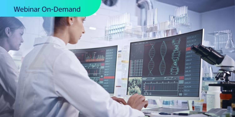 Webinar On-Demand. Bright photograph of two researchers in a lab looking at display with DNA data.