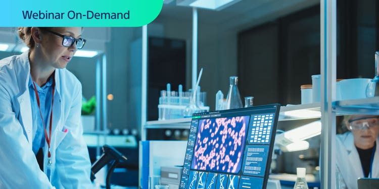 Webinar On-Demand. Photo of a researcher looking at immunotherapy data on a computer display.