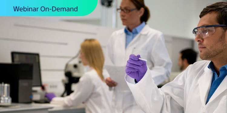 Webinar On-Demand. Photo of reaerchers working in a lab environment.
