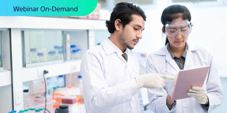 Webinar On-Demand. Photo of two researchers in a lab discussing what they're viewing on a tablet device.
