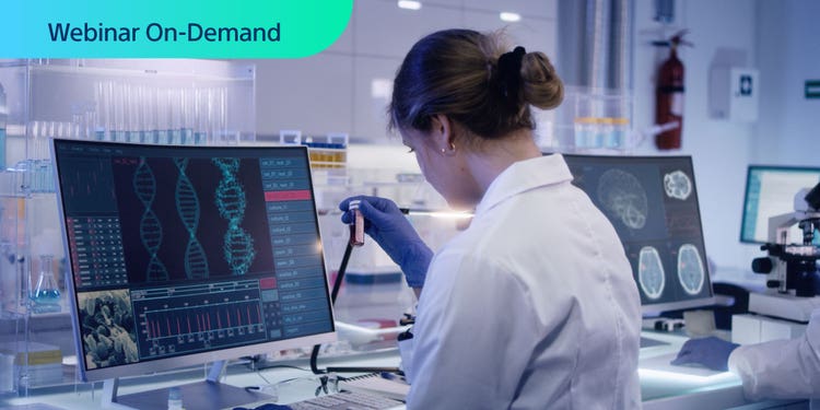 Webinar On-Demand. Photo of researcher in a lab looking at a vial with a computer display with CRISPR data.