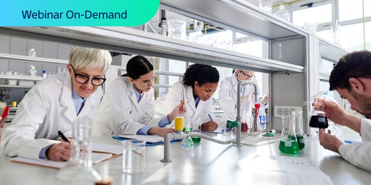 Text: Webinar On-Demand. Phgotograph of researchers in a lab working.