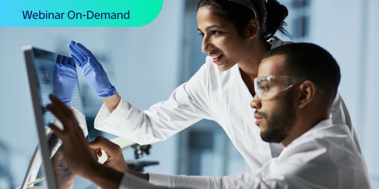 Webinar On-Demand. Two researchers viewing and discussing flow cytometry data on a computer display.