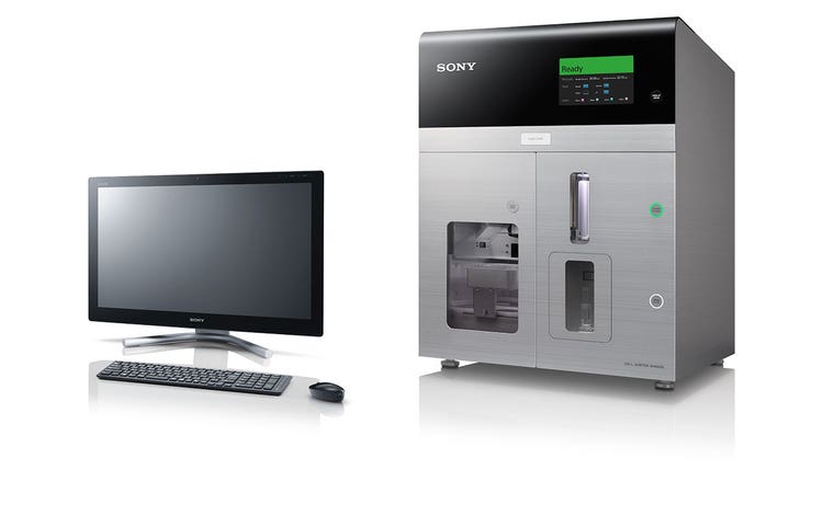 SH800 system with display, keyboard, and mouse on a shiny reflective white surface.