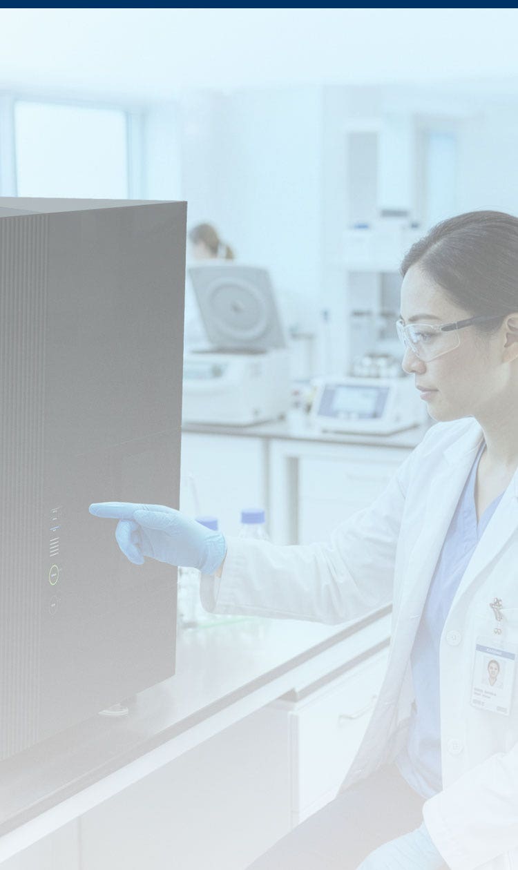 Researcher working with the ID7000 Spectral Cell Analyzer in a lab setting.