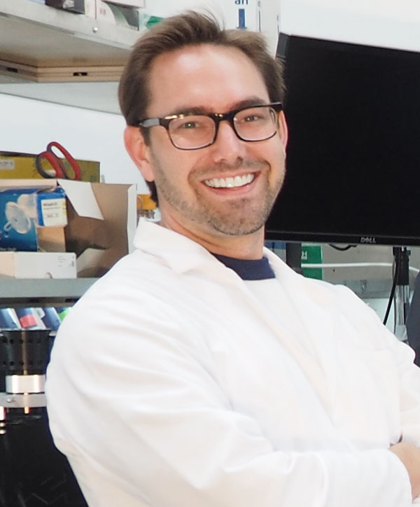 Photo of Dr. Chris Emig in his lab