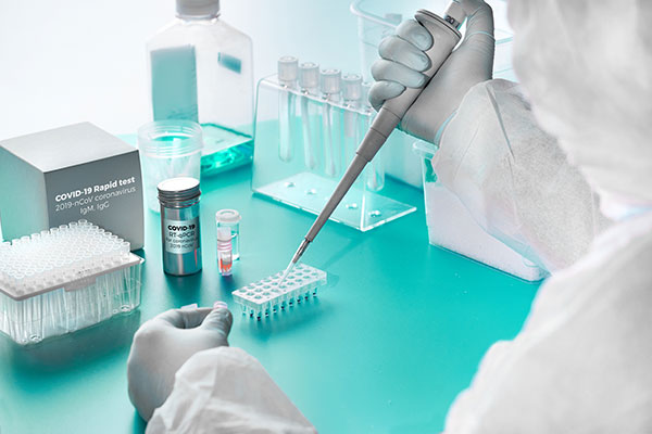Stylized image of researcher using pipet